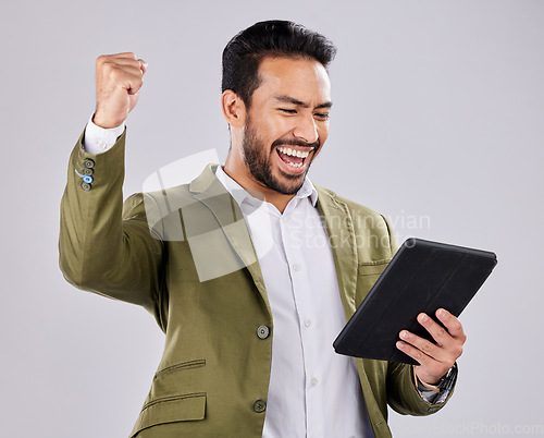 Image of Asian man, tablet or success fist on isolated studio background for financial growth, stock market deal or future security. Smile, happy or cheering businessman with winner hands, technology or loan