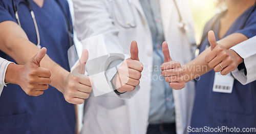 Image of Thumbs up, group hands and teamwork of doctors celebrate success, support and trust in medical clinic. Closeup, healthcare staff and thumb sign in collaboration, agreement and yes emoji of motivation