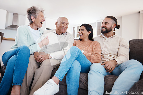 Image of Parents, couple and happy family bonding in a home or house together spending quality time sitting on a couch or sofa. Elderly, holiday and people relax and visit on vacation being carefree