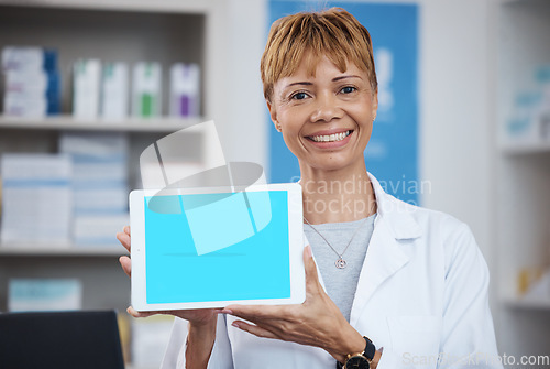 Image of Pharmacy, pharmacist and woman with tablet green screen for advertising, marketing or mockup space. Healthcare, wellness portrait or happy elderly medical doctor with technology for product placement