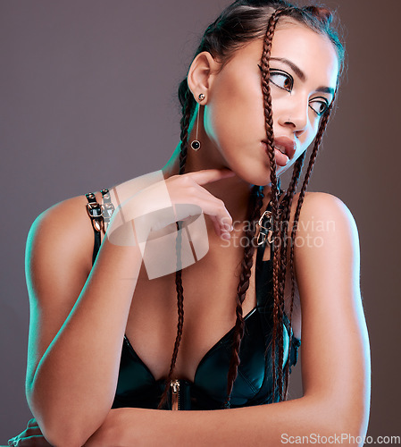 Image of Fashion, grunge and black woman in studio with gen z aesthetic, punk and rocker on brown background. Makeup, edgy and cool girl posing, creative and confident with contemporary, style and attitude