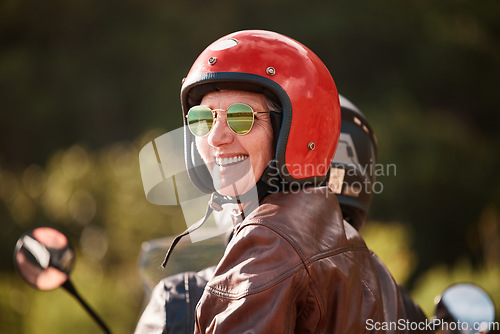 Image of Senior woman, motorcycle road trip and smile with helmet, sunglasses and back for speed, vacation and nature. Elderly lady, happy and travel with motorbike, freedom and fast transportation in summer