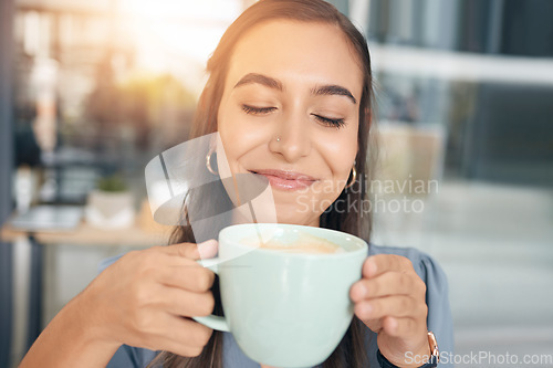 Image of Business woman, face and drinking coffee in office, company and startup with smile, lunch break and happiness. Happy female worker enjoy cup of tea, cappuccino and latte while relaxing in workplace