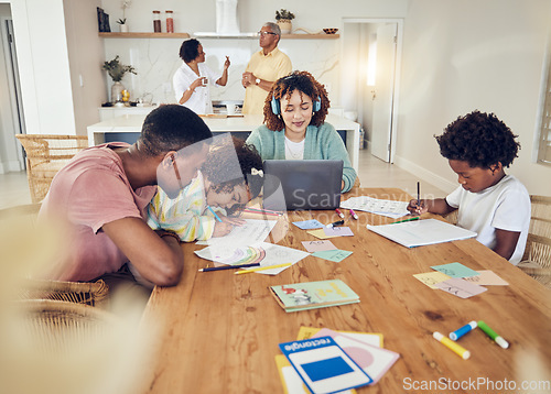 Image of Remote work, homework and busy big family together for work, learning and conversation. Drawing, talking and parents, grandparents and children doing different activities in a house as a group