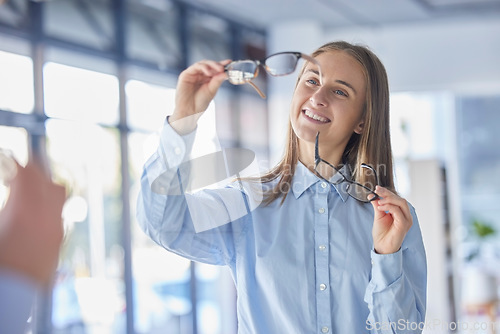 Image of Glasses, choice and vision with a woman at the optometrist for new prescription frame lenses as a customer. Eyewear, decision and shopping with an attractive young female shopper buying eyeglasses
