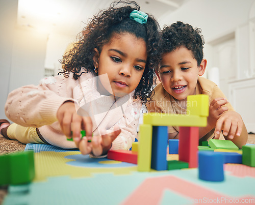 Image of Building blocks, happy children and floor with toys for playing, bonding and educational games at home. Family, child development and boy and girl enjoy creative activity, learning and relaxing