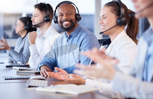 Image of Contact us, call center or portrait of friendly black man in telecom communications company in help desk. Happy smile, crm or face of sales agent working online in technical or customer support