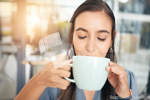 Image of Coffee drink, cup and face of woman drinking hot chocolate, tea or morning beverage for hydration, wellness or to relax. Caffeine, female business manager or corporate office person with espresso mug