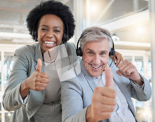 Image of Customer service, thumbs up and diversity, portrait of team happy in office with smile and agreement. Contact us, black woman and man at help desk with support at advisory agency for crm call center.