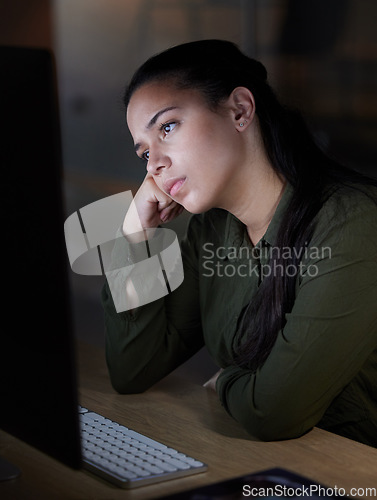 Image of Burnout, computer and bored woman working at night in office, unhappy and frustrated with internet glitch on dark background. Startup, tired and female at work late for deadline, 404 or boring task