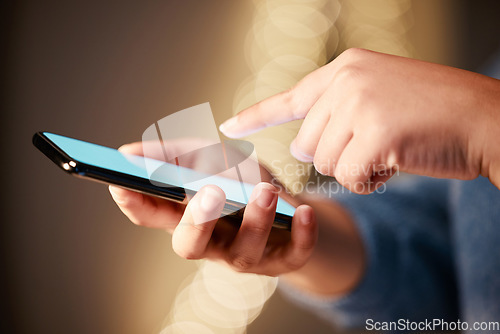 Image of Hands, phone screen and typing in night office, texting or social media in workplace. Mockup, greenscreen and business woman with mobile smartphone for networking, web scrolling or internet browsing