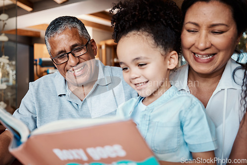 Image of Children book, reading and grandparent helping kids with learning and education on sofa. House, living room and black family on a lounge couch with happiness and books together with love and support