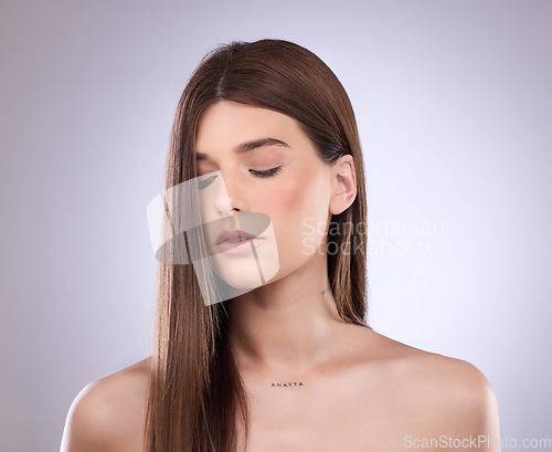 Image of Beauty, face and hair care of woman with eyes closed in studio isolated on a background. Cosmetics, makeup skincare and female model with salon treatment for healthy keratin, balayage and hairstyle.