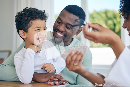 Image of Happy child, glasses choice and father in a doctor office for vision and eye exam with pediatrician. Happiness, dad and young boy together at a clinic looking and lens and frames after a eyes test