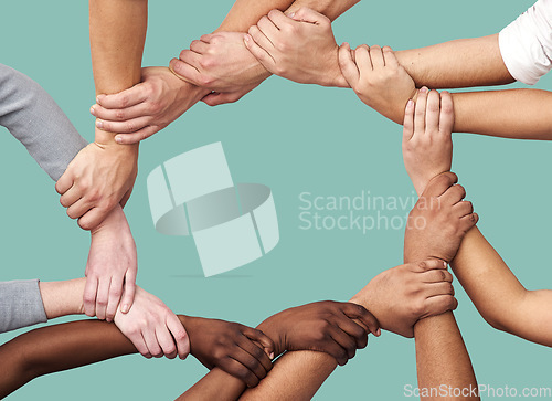 Image of People, diversity and hands together in teamwork collaboration for trust against a studio background. Diverse group holding hand in unity or solidarity for community or agreement in circle on mockup