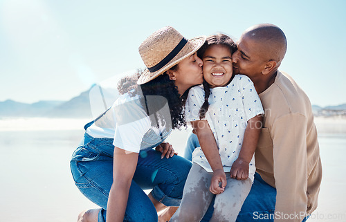 Image of Black family, children and beach with parents kissing their daughter outdoor in nature on the sand by the ocean. Kids, love or summer with a mother and father giving a kiss to their female child