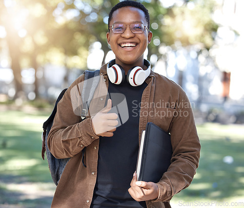 Image of Student, portrait or thumbs up on campus, park nature or garden in college review, university like or school vote. Smile, happy or black person and thumb hands in learning success or education growth