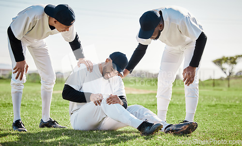 Image of Baseball, team help and man with injury on field after accident, fall or workout in match. Sports, training and male player with fibromyalgia, inflammation pain or broken knee with friends helping.