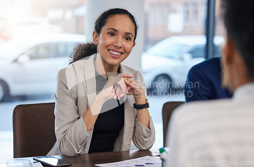 Image of Job interview, happy and woman in office for business meeting, discussion and networking with candidate. We are hiring, smile and friend HR lady explaining hiring process, recruitment and our vision