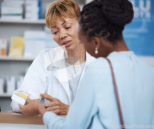 Image of Healthcare, advice and black woman with pharmacist at counter for help on safe medicine and prescription drugs. Health, pharmaceutical info and patient consulting medical professional at pharmacy.