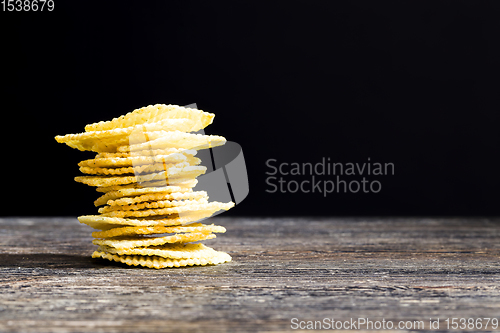Image of chips on a wooden table
