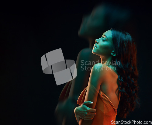 Image of Beauty, overlay and dark mockup with a woman dreaming arms crossed in studio on a black background. Hug, self love and fashion with an attractive young female posing eyes closed for satisfaction