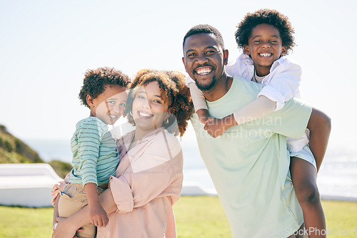 Image of Happy, love and portrait of a black family at a beach for travel, vacation and piggyback on nature in summer. Smile, face and trip with children and parents embrace and bond while traveling in Miami