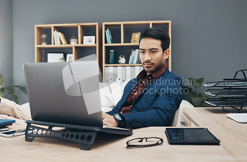 Image of Business, man and laptop for digital planning, thinking or typing for ideas, data analytics or search internet. Male employee, entrepreneur or manager with device, concentration or research in office