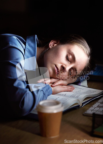 Image of Tired woman sleeping on her desk at night with depression, burnout and mental health risk for project deadline or overworked. Business person, worker or employee sleep, fatigue and low energy in dark