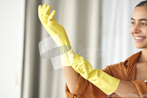 Image of Woman, hands or rubber gloves for spring cleaning, housekeeping or home maintenance of healthcare wellness. Smile, happy or maid cleaner ready for hospitality service in bacteria or safety protection