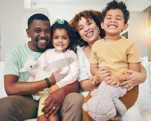 Image of Black family, home portrait and living room sofa of mama, father and children with happiness. Happy, smile and bonding of a mom, dad and young kids together having fun with parent love and support