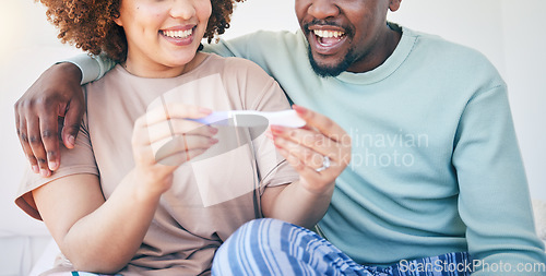 Image of Couple, happy and pregnancy test, smile and excited for good news, positive and results in their house. Hands, woman and man with home testing kit, pregnant and fertility or ivf success while hugging