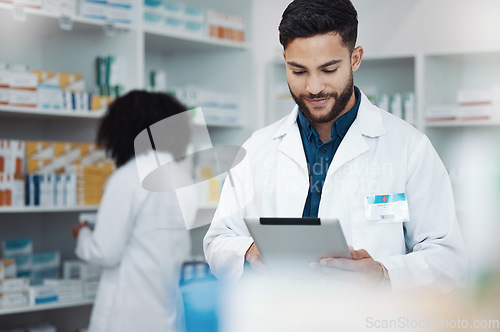 Image of Pharmacy, happy man pharmacist and tablet product management, medicine stock research or online inventory. Digital tech, telehealth service and retail logistics of medical doctor or people in shop