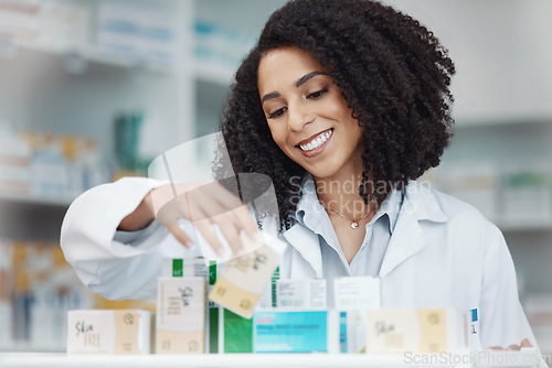 Image of Pharmacy, medicine and smile with woman in store for healthcare, drugs dispensary and treatment prescription. Medical, pills and shopping with pharmacist for check, label information or product