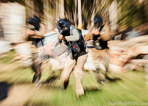 Image of Blurred, military and people with guns for paintball, training and action game in nature. Fitness, defocused and soldier men shooting for war on battlefield, physical activity or cardio in a forest