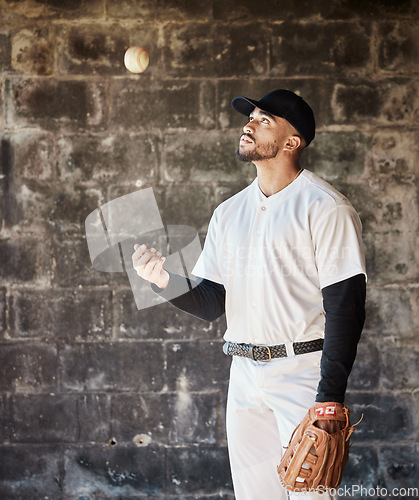 Image of Sports, baseball and man with ball and glove ready for game, match and practice in stadium. Softball mockup, motivation and serious male player focus in dugout for training, exercise and competition