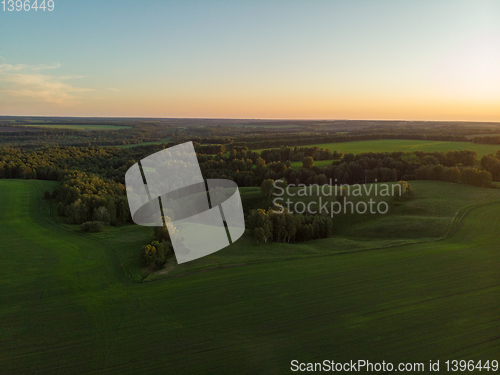 Image of Top aerial view of green fields and meadows