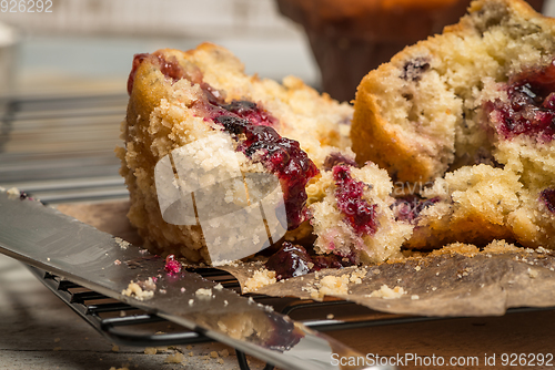 Image of Muffins with red fruits jam fill.