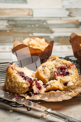 Image of Muffins with red fruits jam fill.