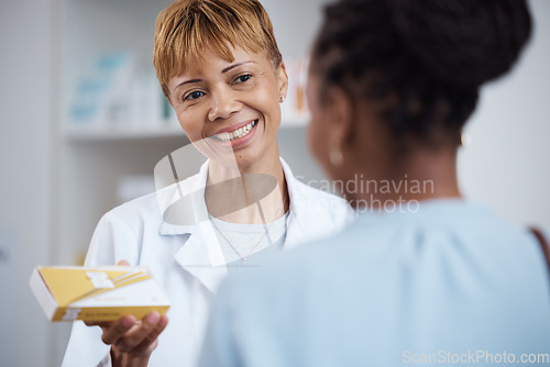 Image of Pharmacy, pharmacist and woman with medicine for customer, pills or box in drugstore. Healthcare, smile or happy medical doctor with prescription medication, drugs or vitamins, supplements or product