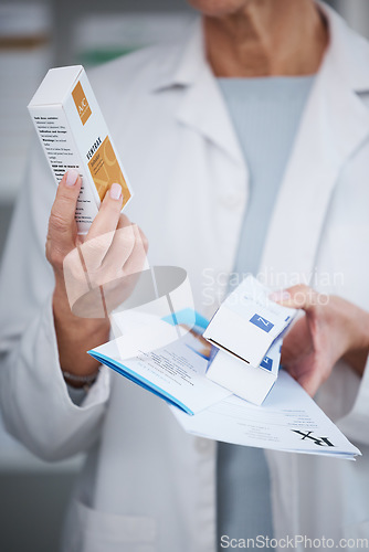 Image of Pharmacy, pharmacist and hands with inhaler medicine, pills or box in drugstore or shop. Healthcare, wellness and medical doctor, female or woman holding medication or drugs, vitamins or supplements.
