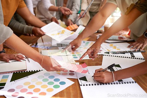 Image of Color design, creative and hands of business people on desk for branding meeting, strategy and marketing logo. Teamwork, collaboration and designers brainstorming ideas, thinking and project plan