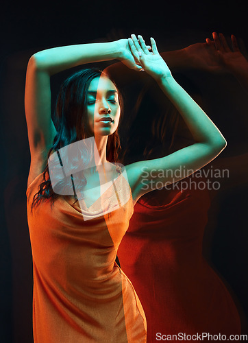 Image of Double exposure, abstract fashion and woman in a dress isolated on a black background in studio. Freedom, art and an artistic girl posing for creativity, style and elegance on a dark backdrop