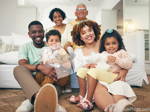 Image of Happy, interracial and portrait of a big family bonding, smiling and playing during a visit. Smile, quality time and parents, grandparents and children sitting in a living room for happiness at home