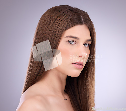 Image of Face portrait, beauty and hair care of a woman in studio isolated on gray background. Makeup cosmetics, growth and female model with salon treatment for healthy keratin, balayage or hairstyle texture