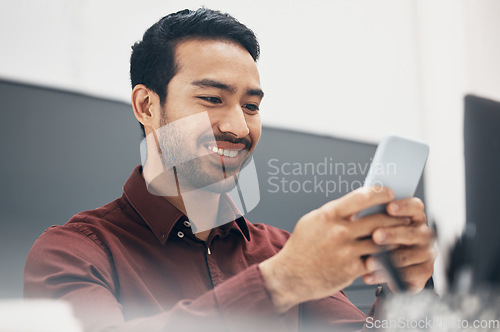 Image of Phone, smile and businessman texting a social media message in an office online, internet or web laughing at meme. Funny, searching and corporate employee browsing website or mobile app on smartphone