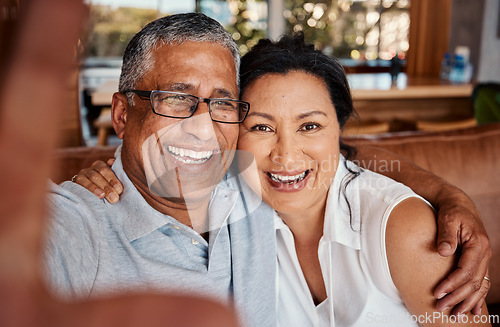 Image of Portrait, selfie and laughing senior couple taking pictures in home for social media, happy memory or profile picture. Love, retirement smile and photography or photo of elderly man and woman.