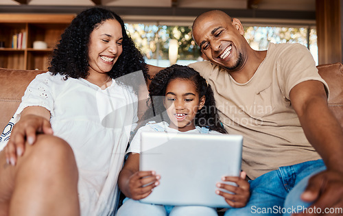 Image of Family laughing, relax and girl with tablet on sofa in home living room for social media, funny video streaming or comic movie. Technology, smile and happy father, mother and child with touchscreen.