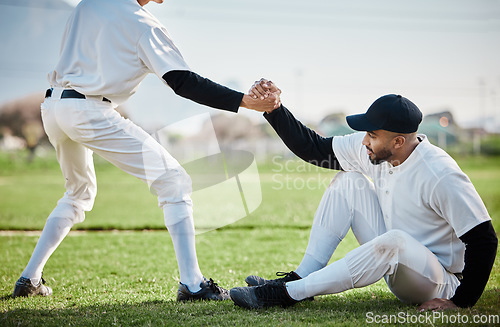 Image of Teamwork, helping hand or baseball player in training, exercise or workout in practice match on sports field. Softball, strong man or people in tough competitive game with physical fitness or effort