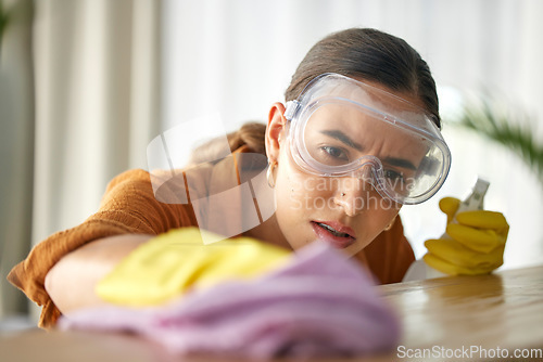 Image of Frustrated, woman or spray bottle for cloth wipe in spring cleaning, housekeeping stress or home healthcare service. Anxiety, problem or annoyed maid cleaner and goggles or furniture product for dust